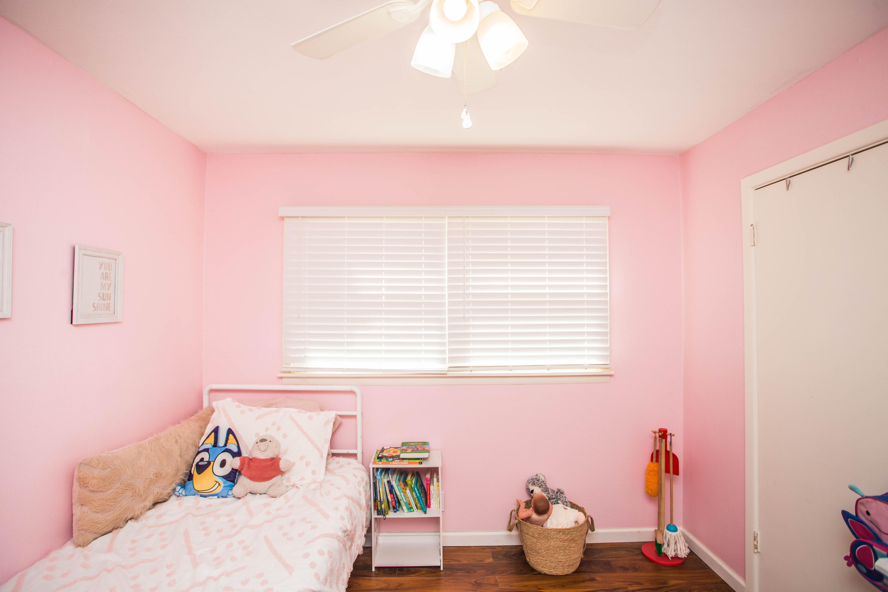 1550 West Lynn Street Slaton, TX 79364 - Photo 26 of 54 a bedroom with a bed and a window