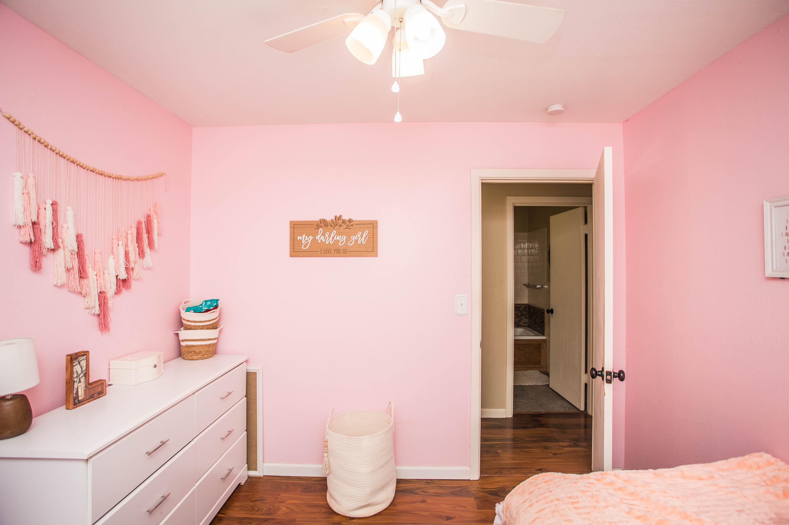 1550 West Lynn Street Slaton, TX 79364 - Photo 27 of 54 a bathroom with a sink a toilet and shower