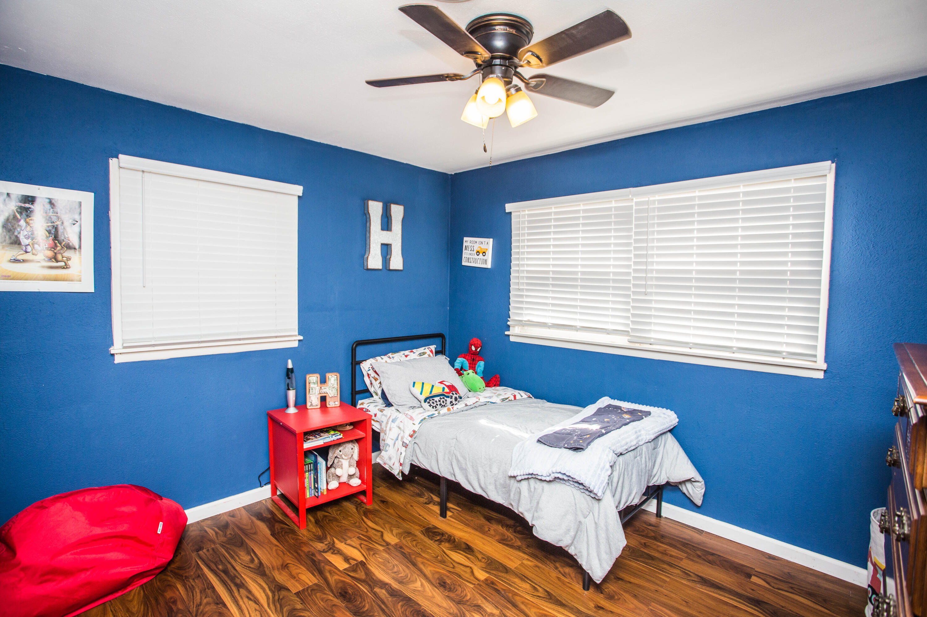 1550 West Lynn Street Slaton, TX 79364 - Photo 32 of 54 a bedroom with a bed and a window