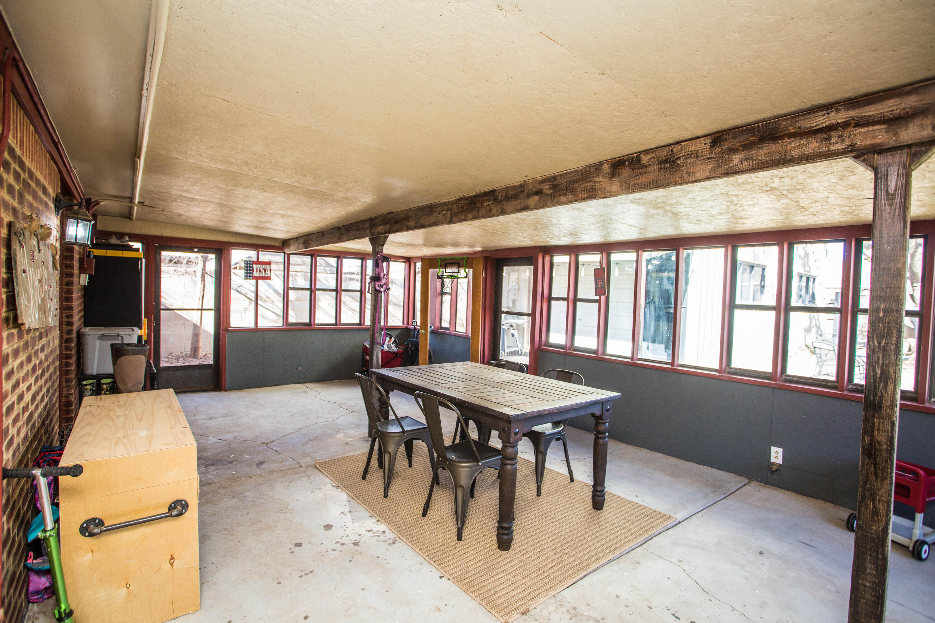 1550 West Lynn Street Slaton, TX 79364 - Photo 37 of 54 a dining room with furniture and window