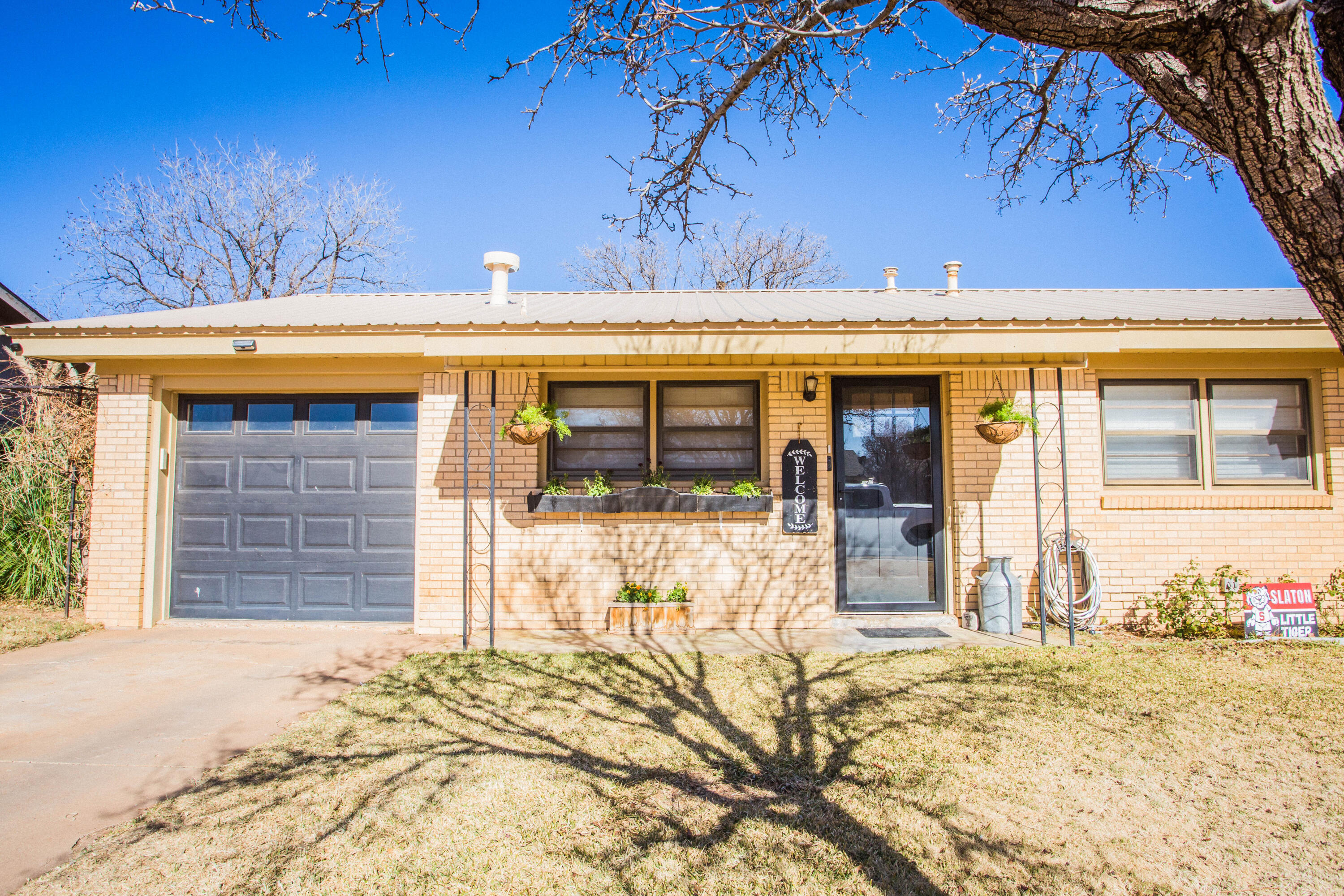 1550 West Lynn Street Slaton, TX 79364 - Photo 50 of 54 a view of a house with a outdoor space