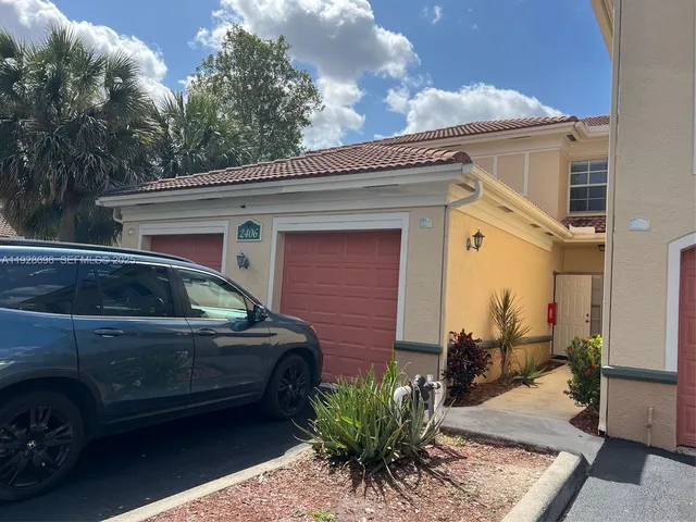 a car parked in front of a house