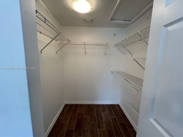 a view of a room with racks on the wall