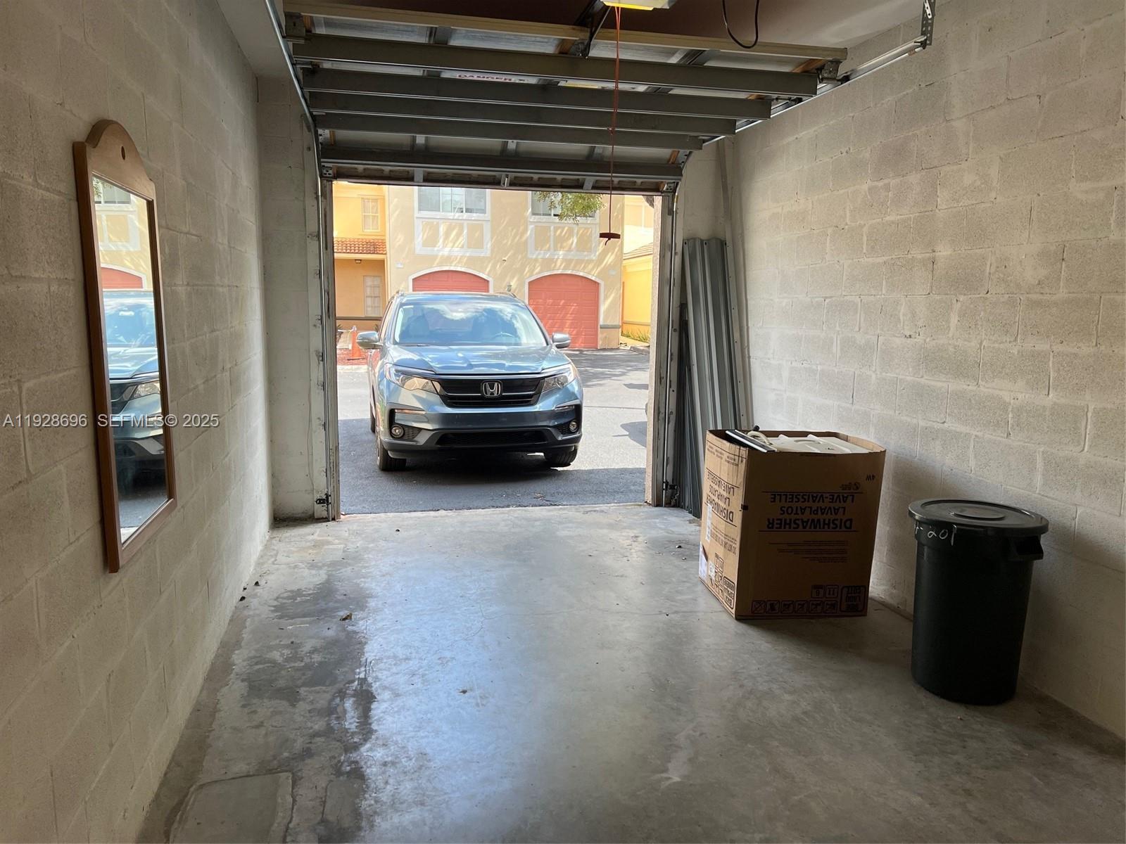 2406 Centergate Drive, Unit 201 Miramar, FL 33025 - Photo 31 of 41 a living room with furniture