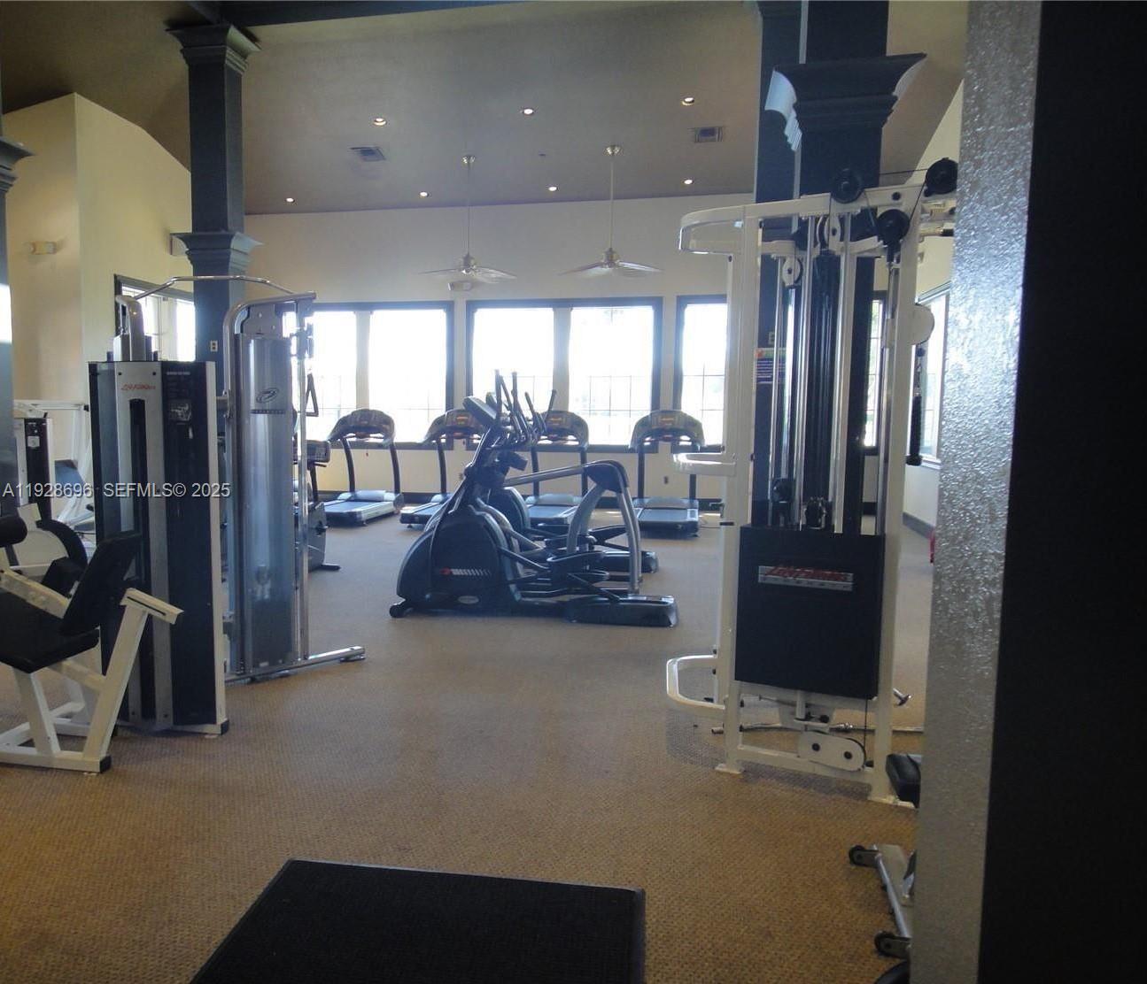 2406 Centergate Drive, Unit 201 Miramar, FL 33025 - Photo 41 of 41 a view of a room with gym equipment