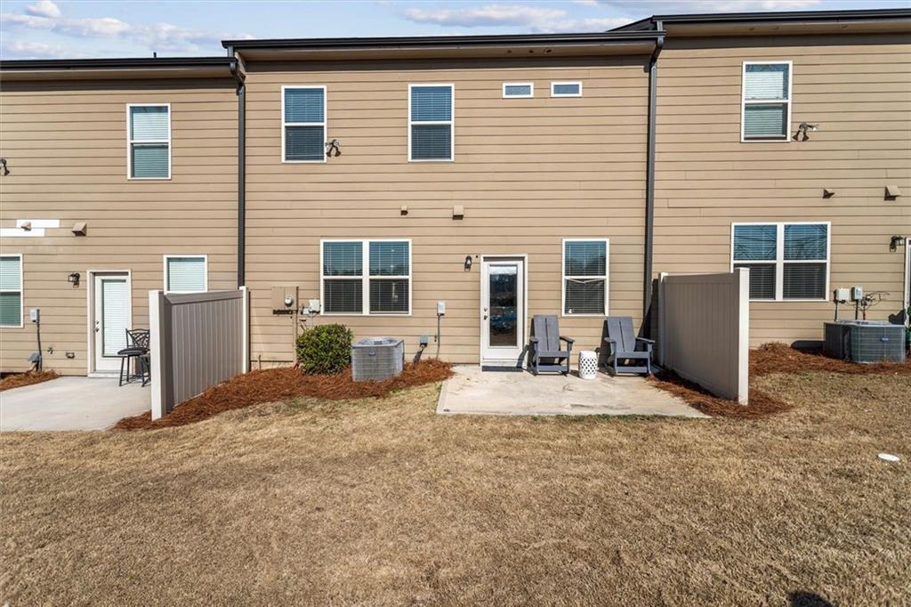 2787 Pearl Rdg Trace Buford, GA 30519 - Photo 16 of 52 a view of backyard of house
