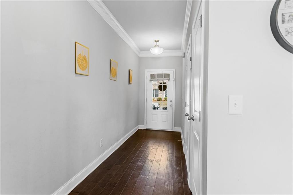 2787 Pearl Rdg Trace Buford, GA 30519 - Photo 20 of 52 a view of hallway with wooden floor