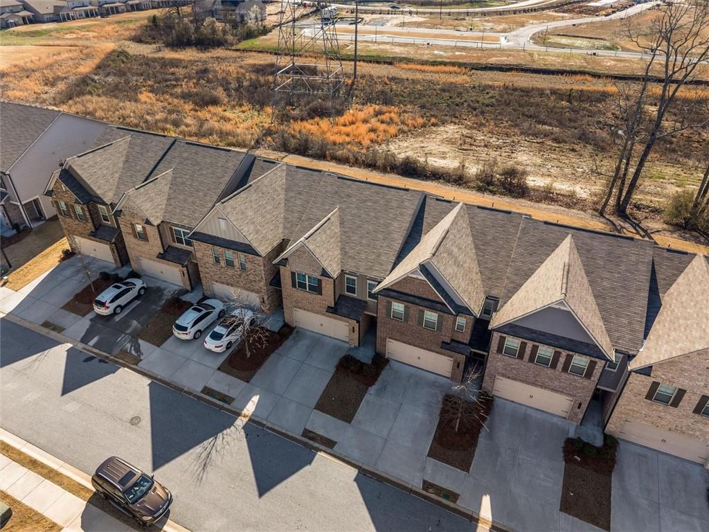 2787 Pearl Rdg Trace Buford, GA 30519 - Photo 2 of 52 a roof deck with couch and chairs