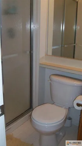 a building with swimming pool in front of it