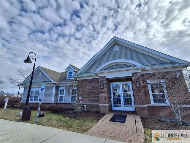 a view of a balcony with wooden floor
