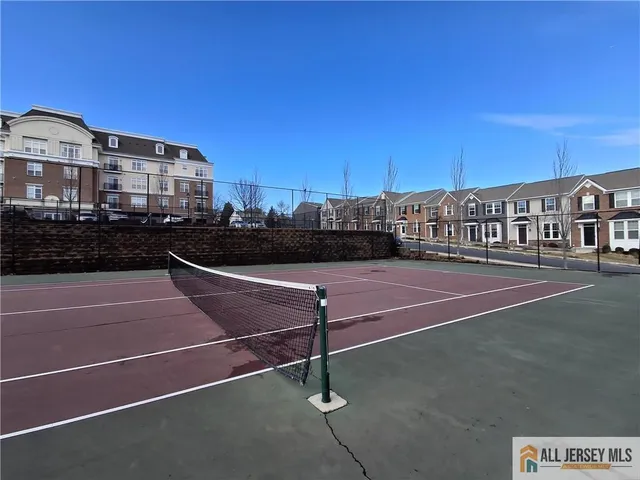 a room with gym equipment and a large window