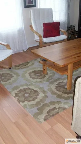 a view of an empty room with stairs