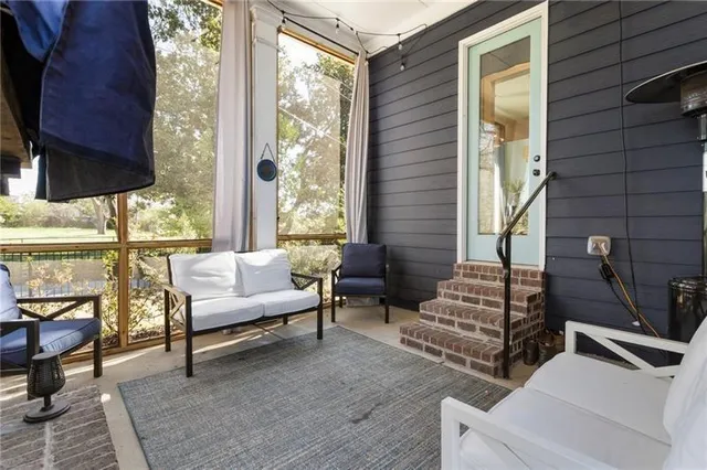 a view of a workspace with furniture