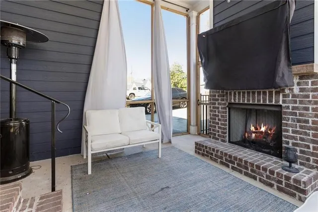 a bedroom with furniture and wooden floor