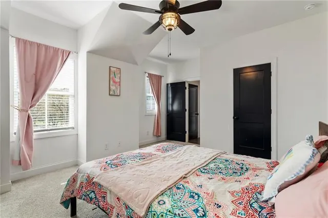 an aerial view of residential building and parking space