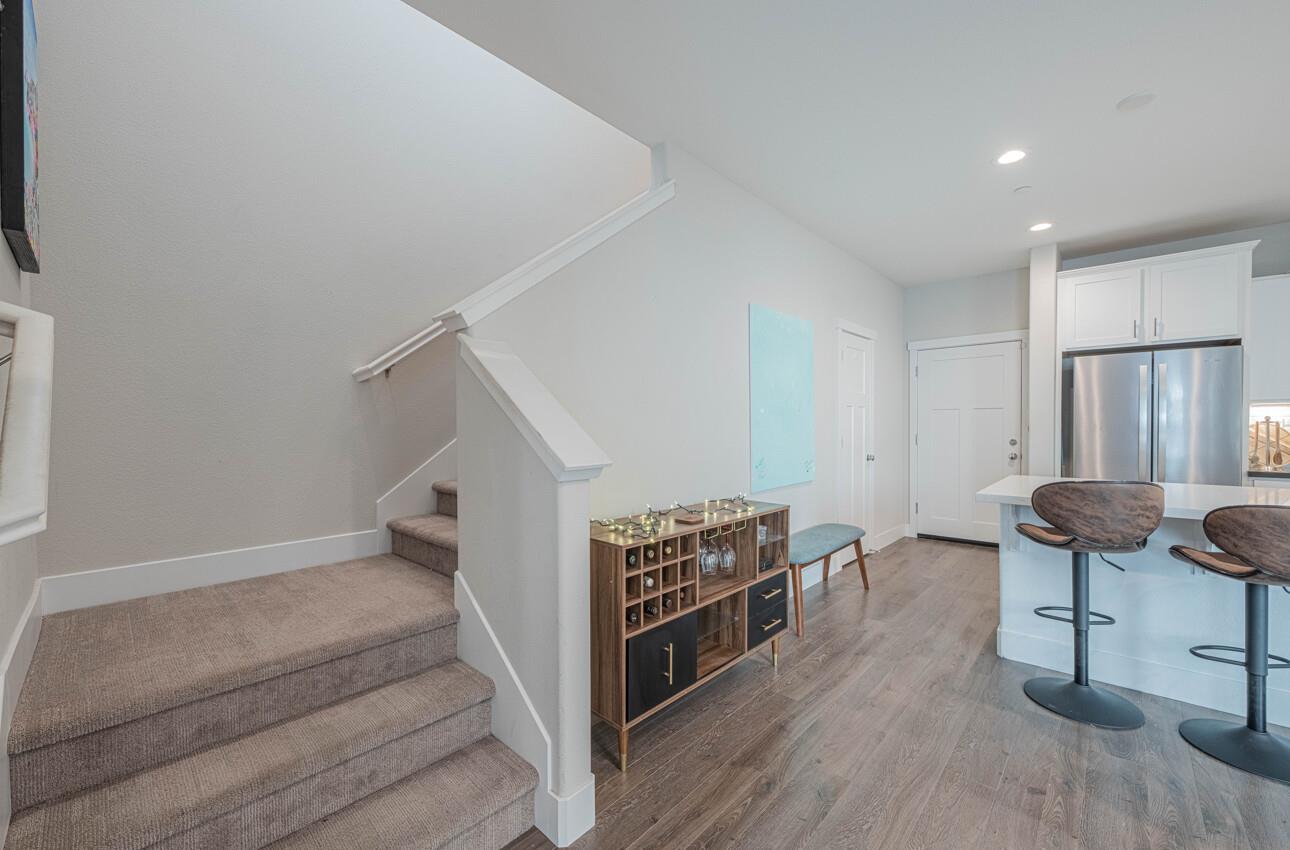 19130 Fallingwater Lane Marina, CA 93933 - Photo 15 of 43 a view of hallway with furniture and wooden floor