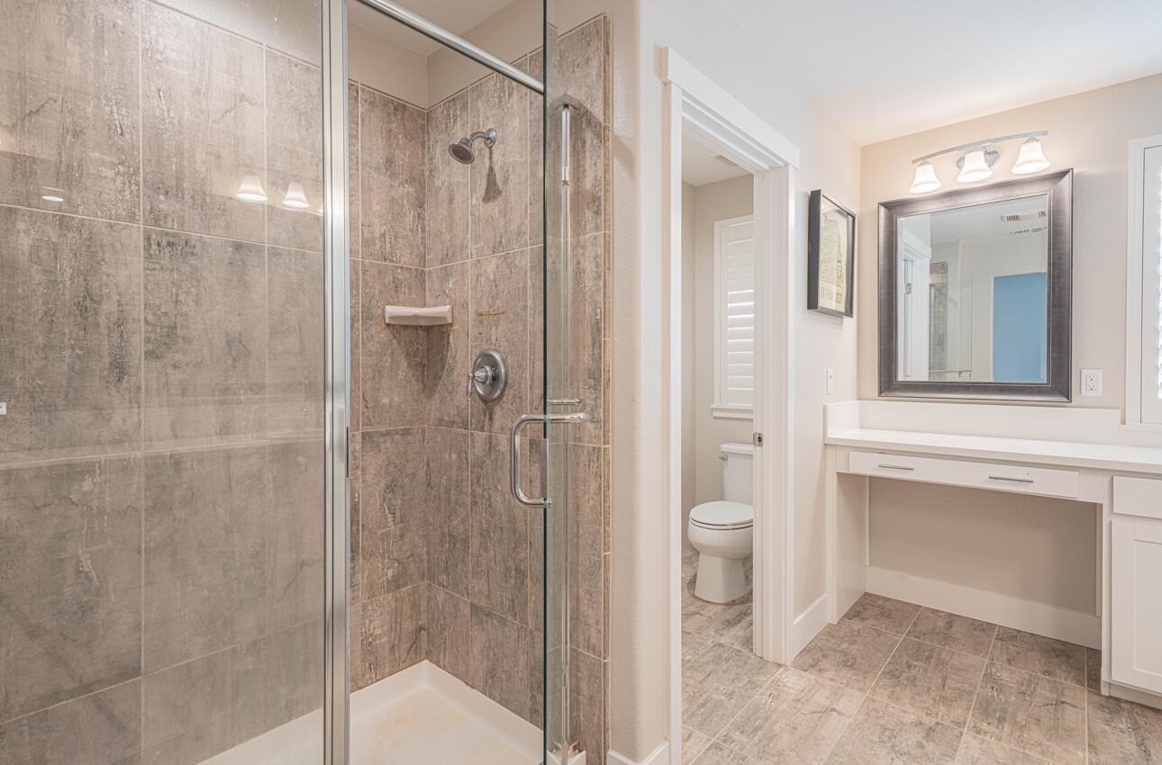 19130 Fallingwater Lane Marina, CA 93933 - Photo 24 of 43 a bathroom with a shower and toilet