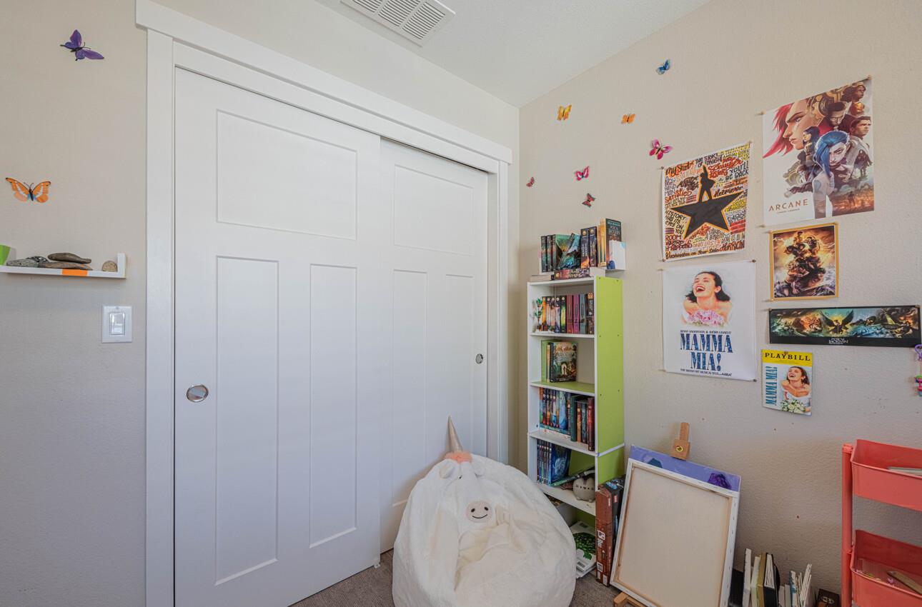 19130 Fallingwater Lane Marina, CA 93933 - Photo 29 of 43 a bathroom with a toilet and a shower curtain