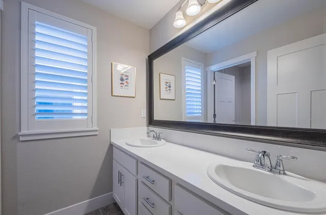 a bathroom with a shower and toilet