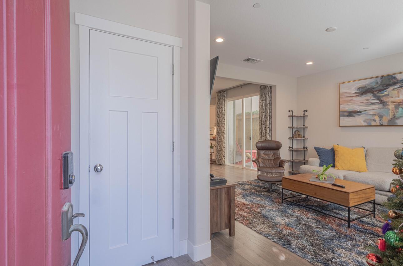 19130 Fallingwater Lane Marina, CA 93933 - Photo 3 of 43 a living room with furniture and a window