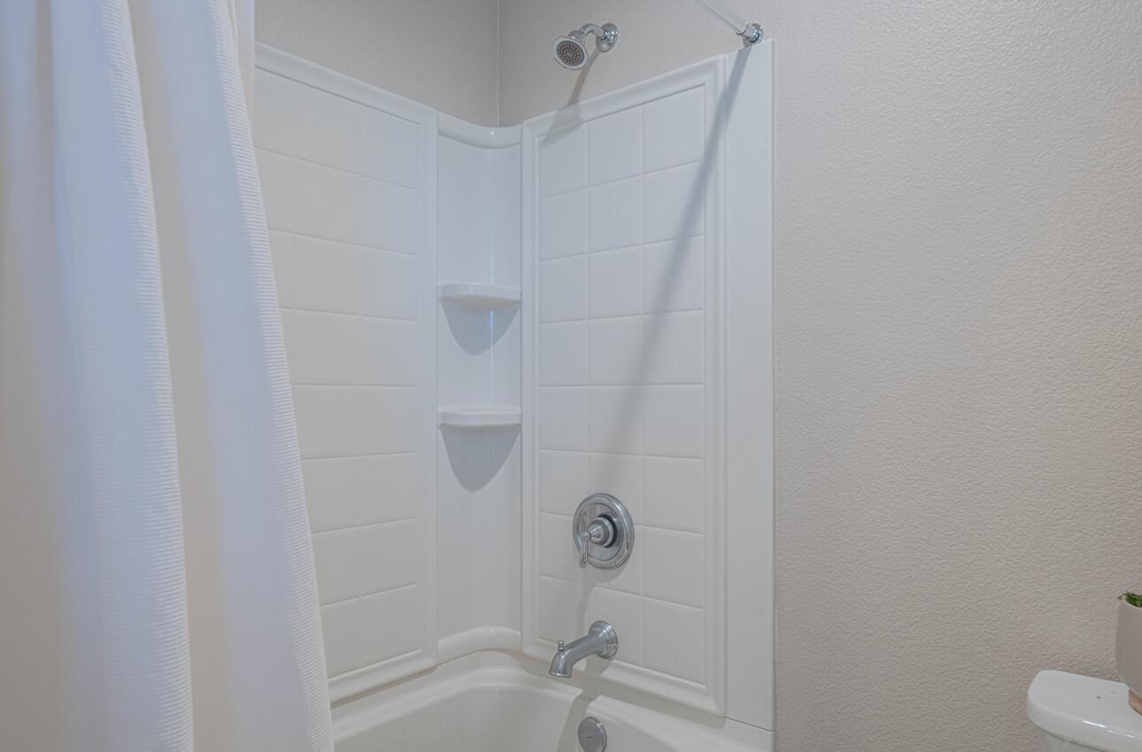 19130 Fallingwater Lane Marina, CA 93933 - Photo 31 of 43 a bathroom with a shower and toilet