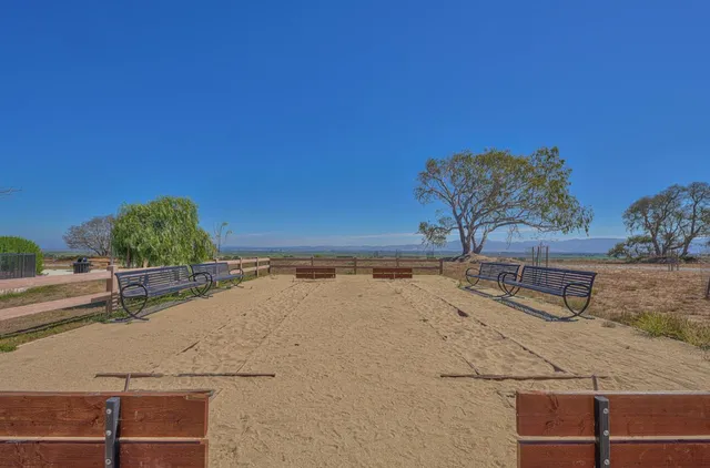 a view of multiple houses with a yard