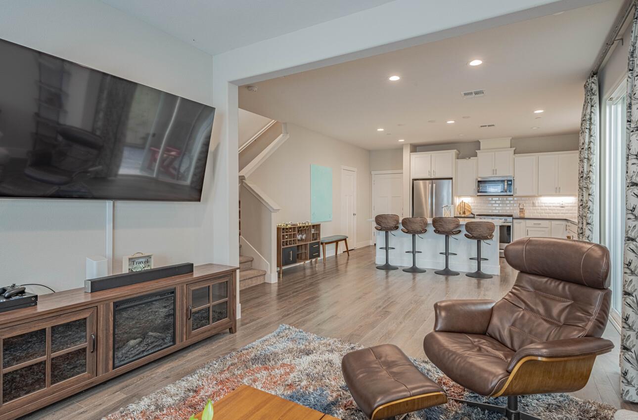 19130 Fallingwater Lane Marina, CA 93933 - Photo 6 of 43 a living room with furniture or kitchen view and a wooden floor