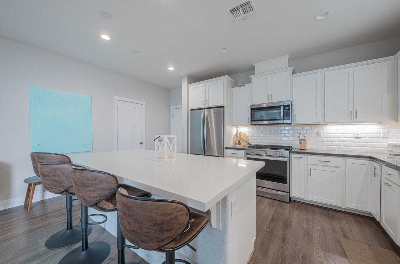 19130 Fallingwater Lane Marina, CA 93933 - Photo 9 of 43 a view of kitchen with sink refrigerator and stove