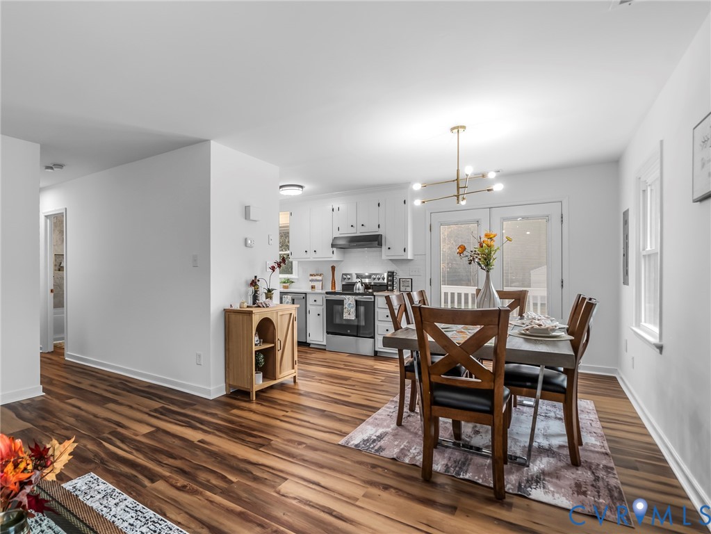 2509 Indale Road Glen Allen, VA 23060 - Photo 13 of 45 a view of a dining room with furniture and a wooden floor