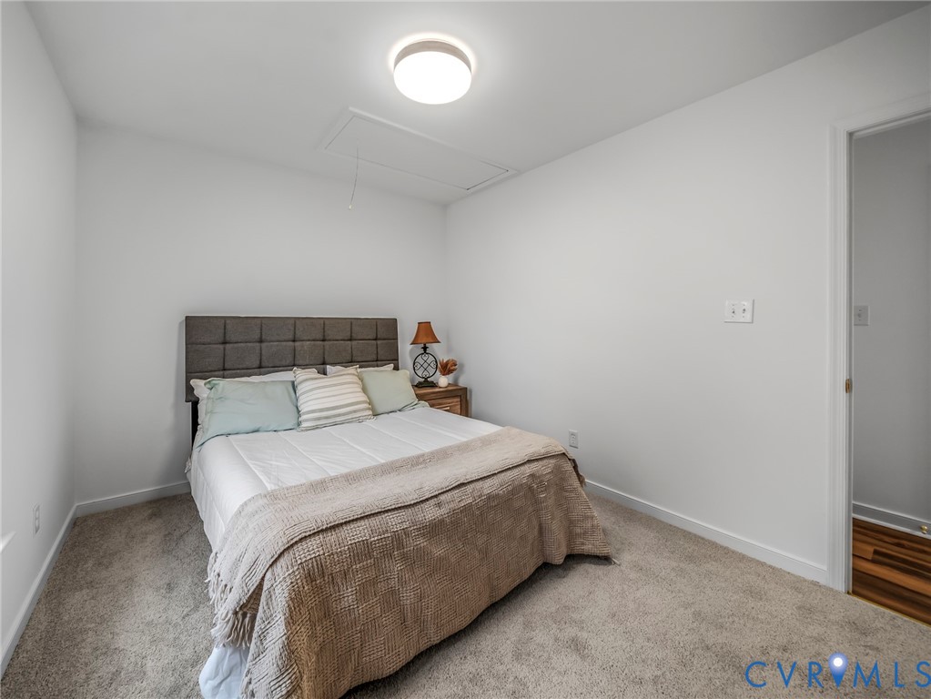2509 Indale Road Glen Allen, VA 23060 - Photo 23 of 45 a bedroom with a bed and a tv