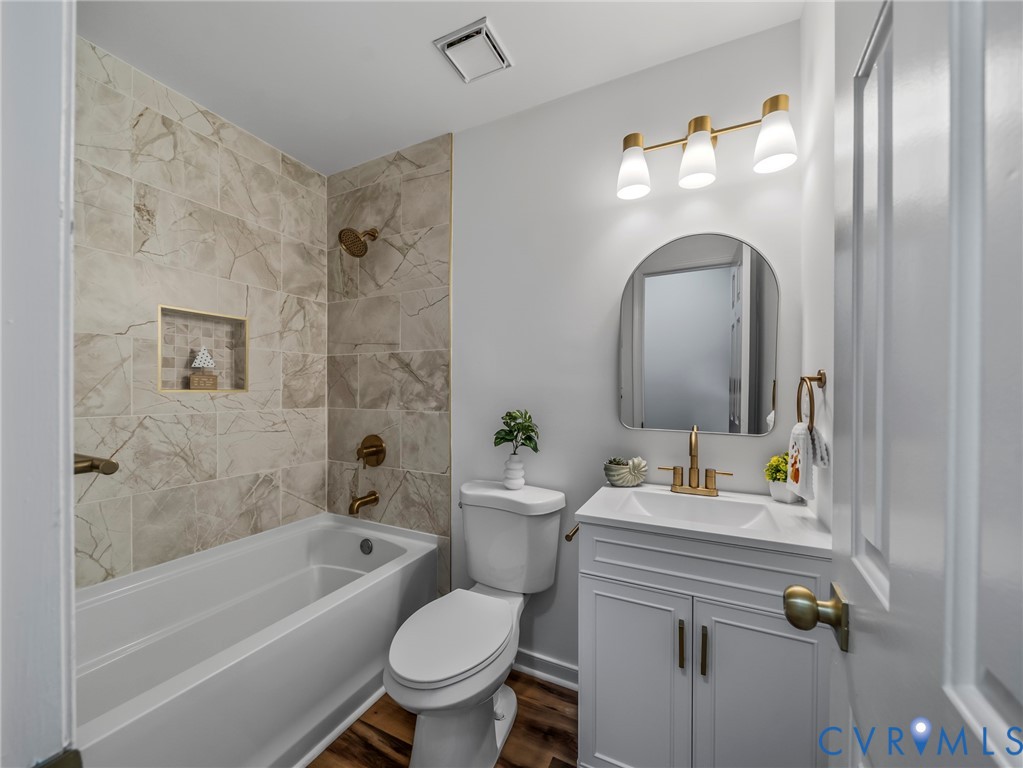 2509 Indale Road Glen Allen, VA 23060 - Photo 24 of 45 a bathroom with a sink toilet and shower