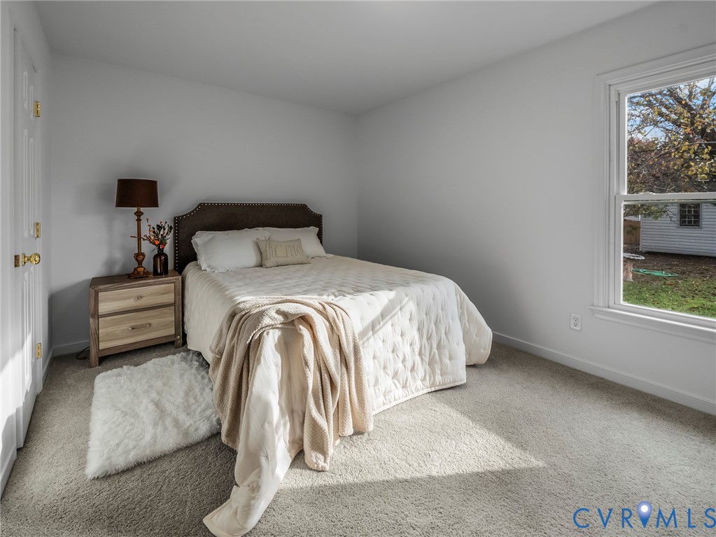2509 Indale Road Glen Allen, VA 23060 - Photo 28 of 45 a bedroom with a bed and a window