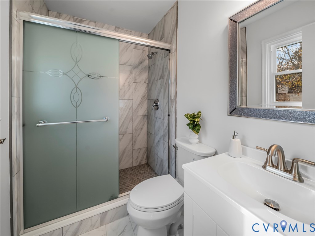 2509 Indale Road Glen Allen, VA 23060 - Photo 32 of 45 a bathroom with a sink toilet and shower