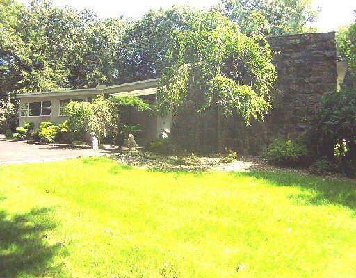 59 Valley Forge Road Weston, CT 06883 - Photo 1 of 1 a view of swimming pool with an outdoor space and seating area