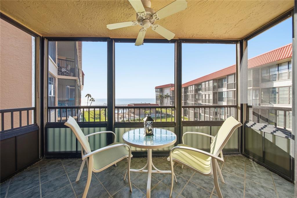 17580 Gulf Boulevard, Unit 302 Redington Shores, FL 33708 - Photo 12 of 37 a view of a dining room with furniture window and outside view