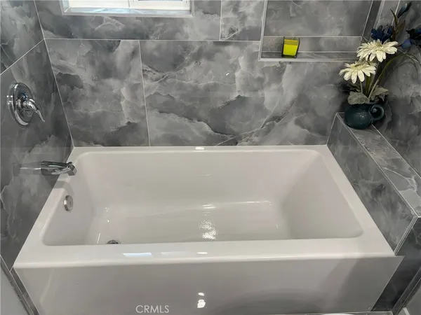 a bathroom with a bathtub