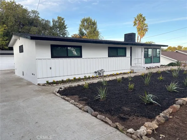 a view of a house with a patio