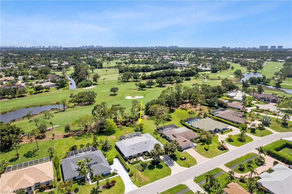 1986 Imperial Golf Course Boulevard Naples, FL 34110 - Photo 2 of 38 an aerial view of multiple house