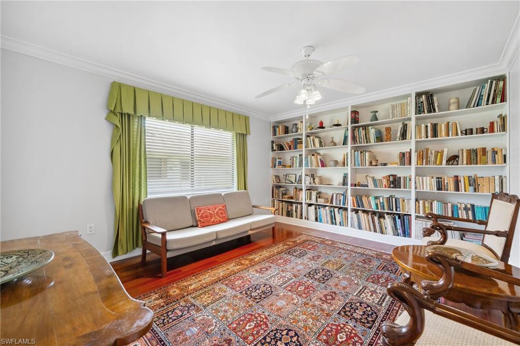 1986 Imperial Golf Course Boulevard Naples, FL 34110 - Photo 23 of 38 a living room with furniture and a rug