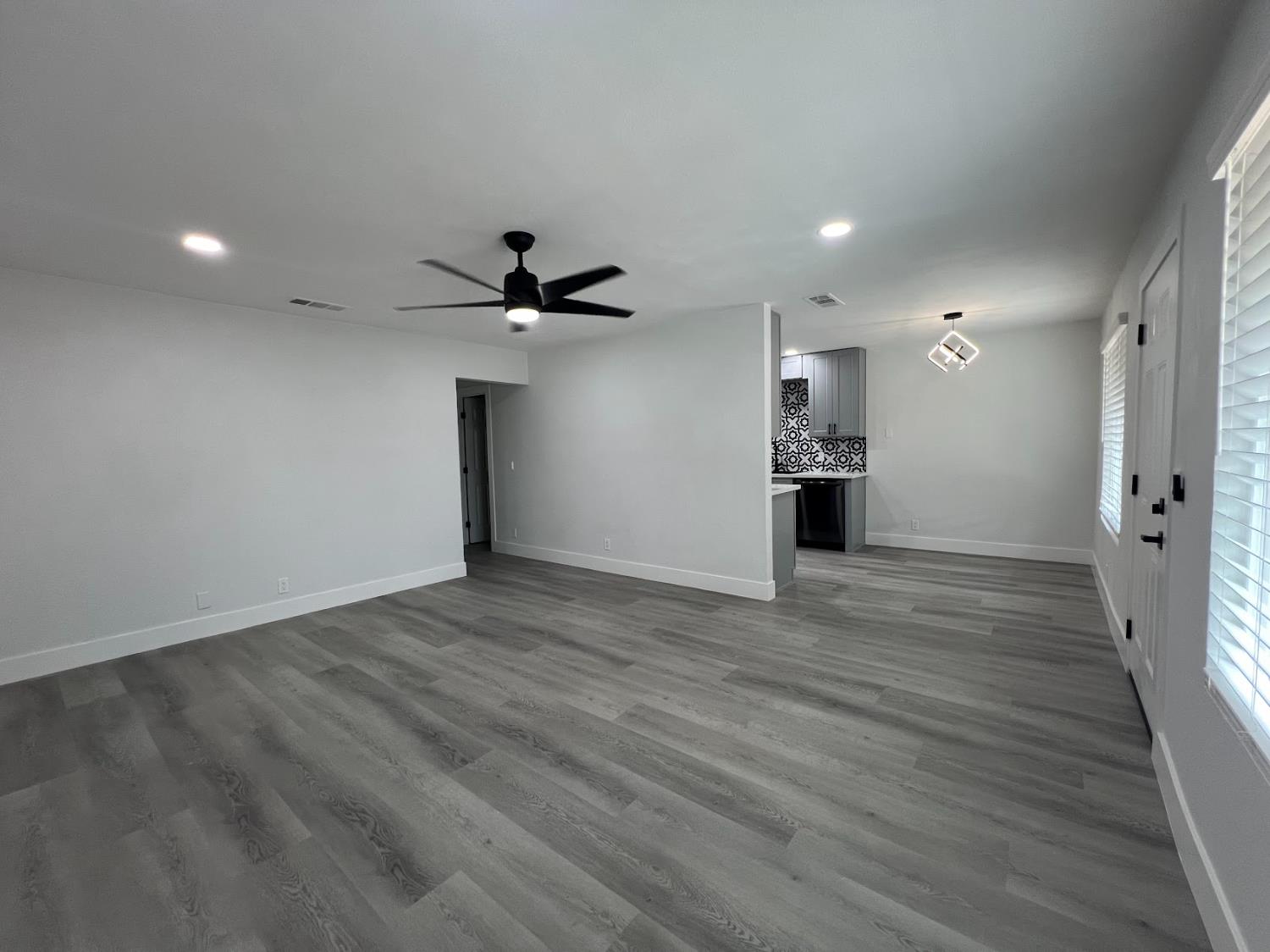 657 West Parlier Avenue, Unit 125 Reedley, CA 93654 - Photo 3 of 25 a view of a kitchen with a sink and a refrigerator