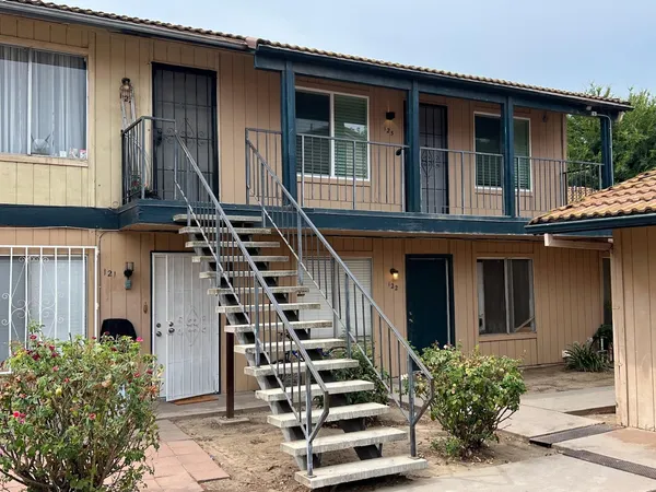 a front view of house with stairs