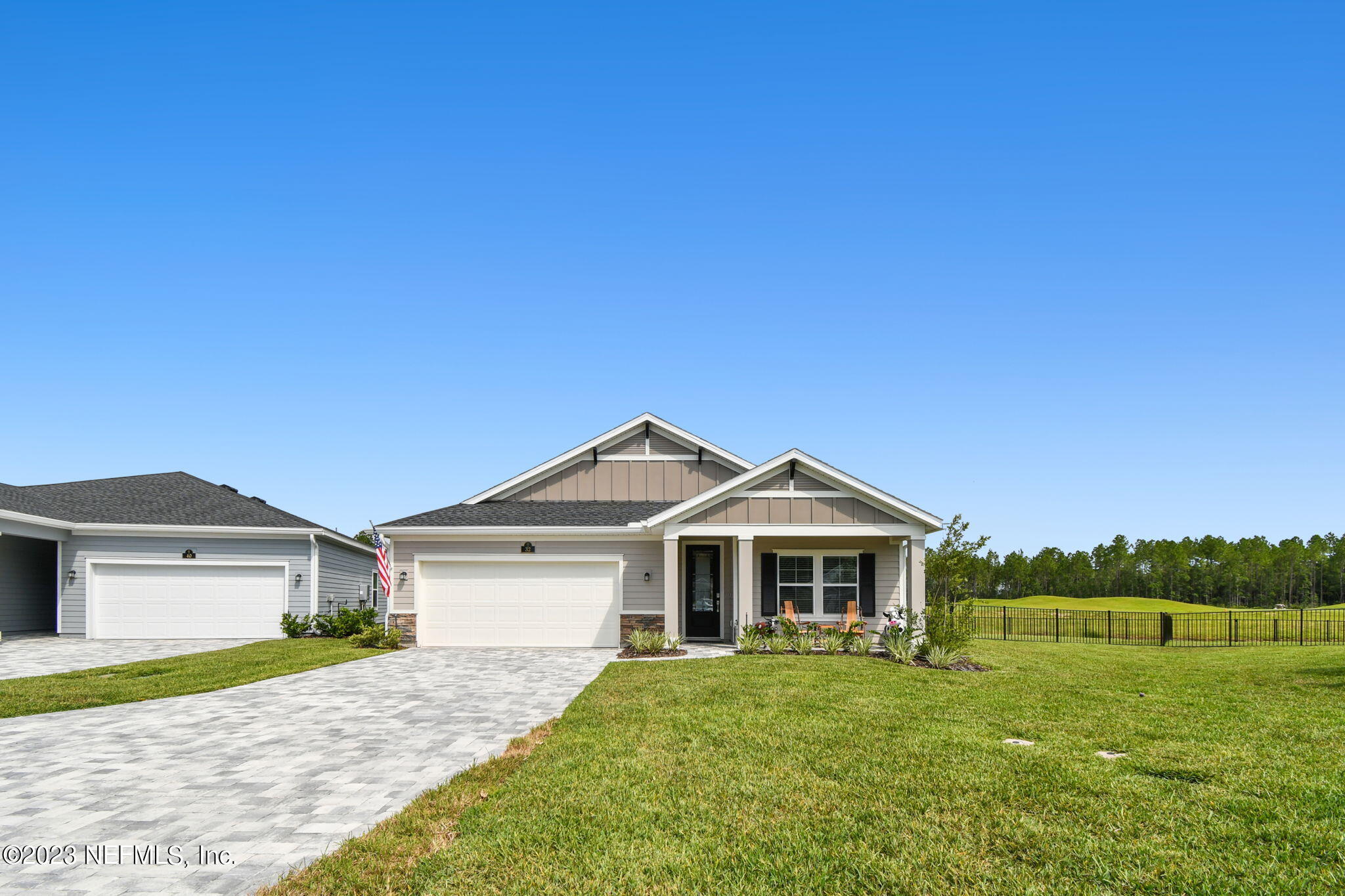 32 Quota Circle St. Johns, FL 32259 - Photo 2 of 79 a front view of a house with garden