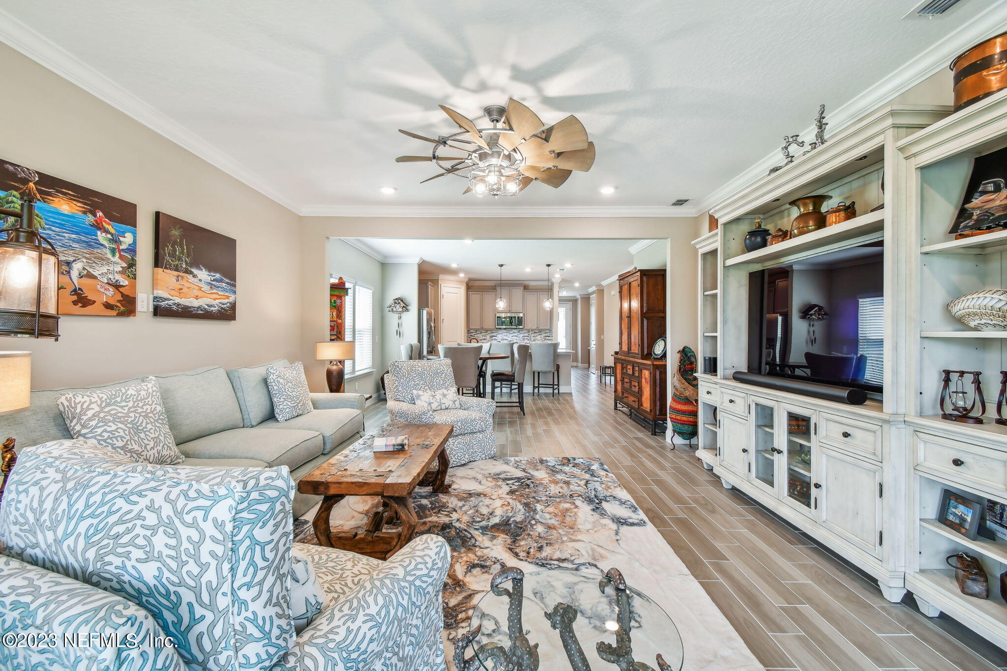 32 Quota Circle St. Johns, FL 32259 - Photo 33 of 79 a living room with furniture and a flat screen tv