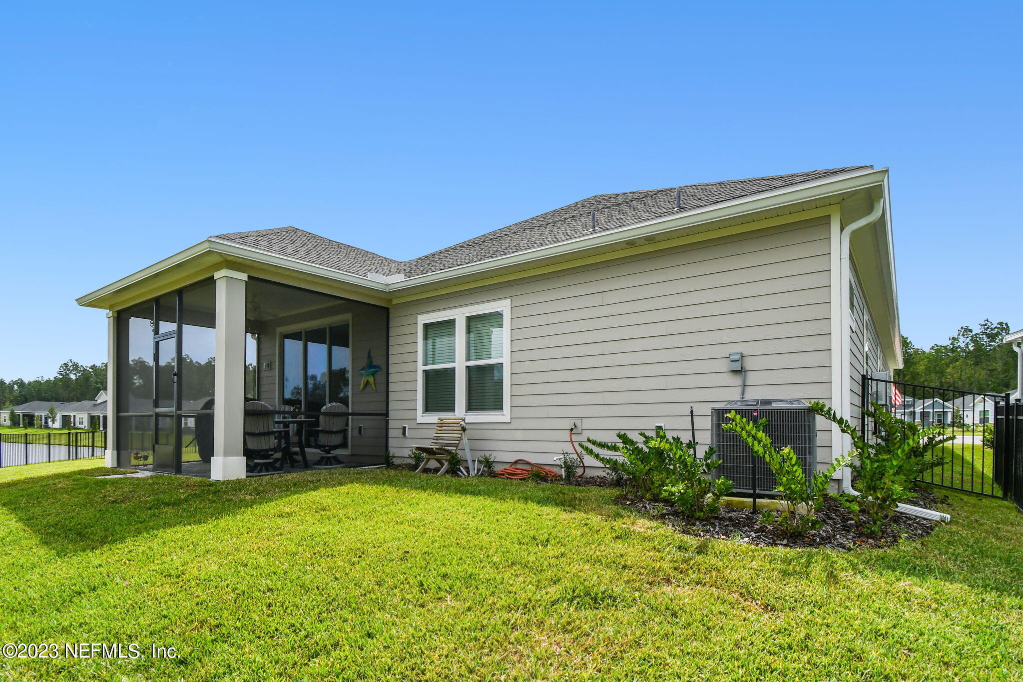 32 Quota Circle St. Johns, FL 32259 - Photo 57 of 79 a front view of a house with a garden