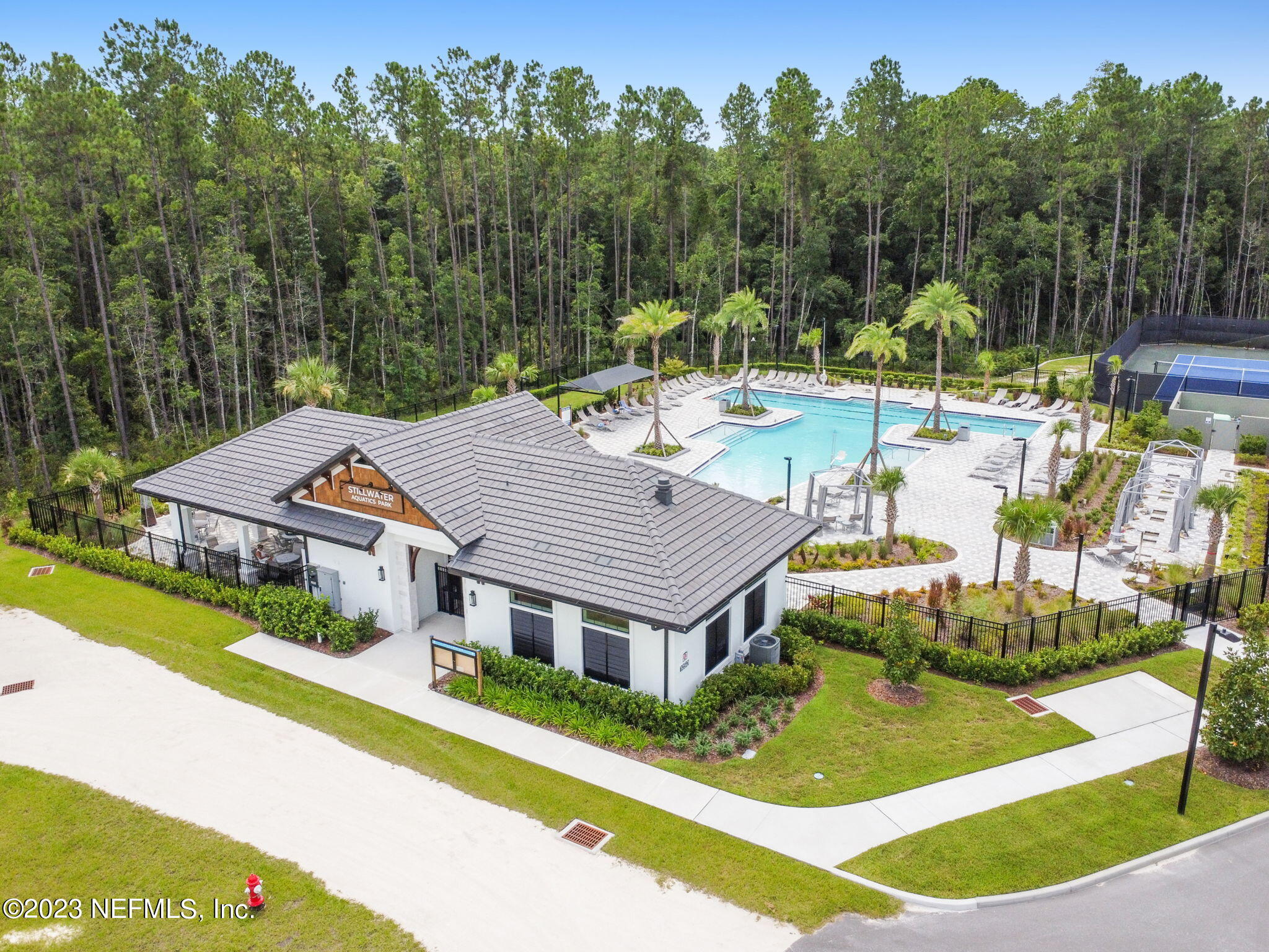 32 Quota Circle St. Johns, FL 32259 - Photo 73 of 79 a aerial view of a house with swimming pool and a yard