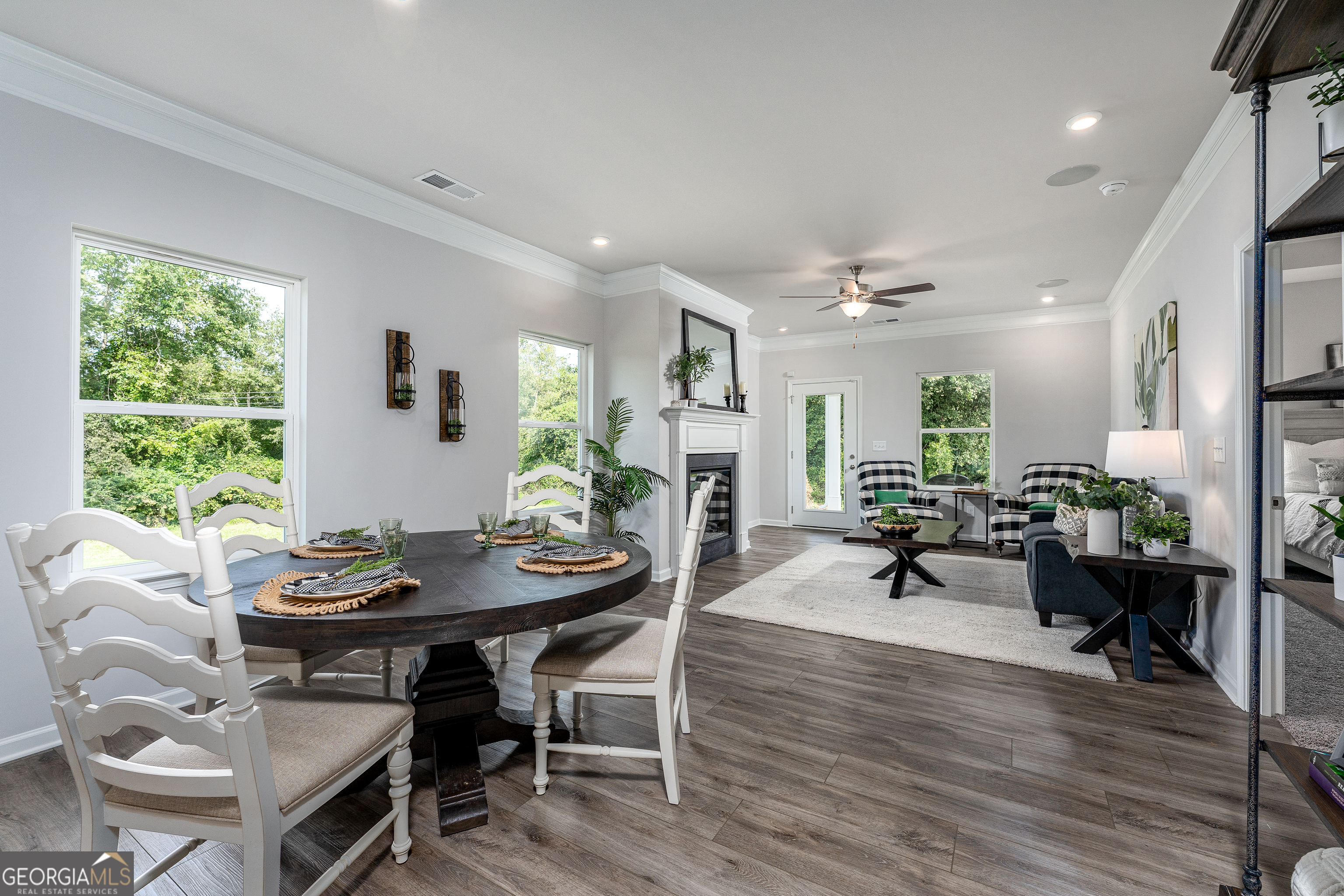 1393 Trellis Court Hampton, GA 30228 - Photo 15 of 25 a view of a dining room with furniture and wooden floor