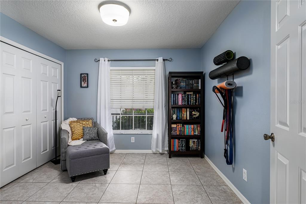 11493 Walden Loop Parrish, FL 34219 - Photo 16 of 30 a living room with furniture and a window
