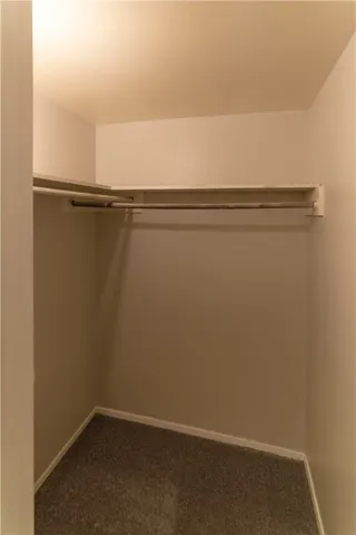 a kitchen with stainless steel appliances granite countertop a refrigerator sink stove and refrigerator