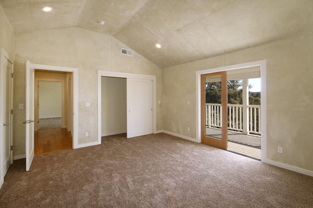 125 Charman Hill Road Aptos, CA 95003 - Photo 12 of 22 an empty room with windows