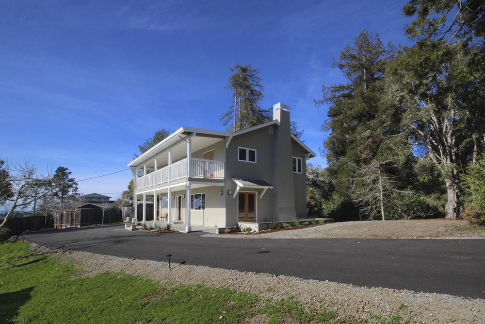 125 Charman Hill Road Aptos, CA 95003 - Photo 2 of 22 a front view of a house with a yard